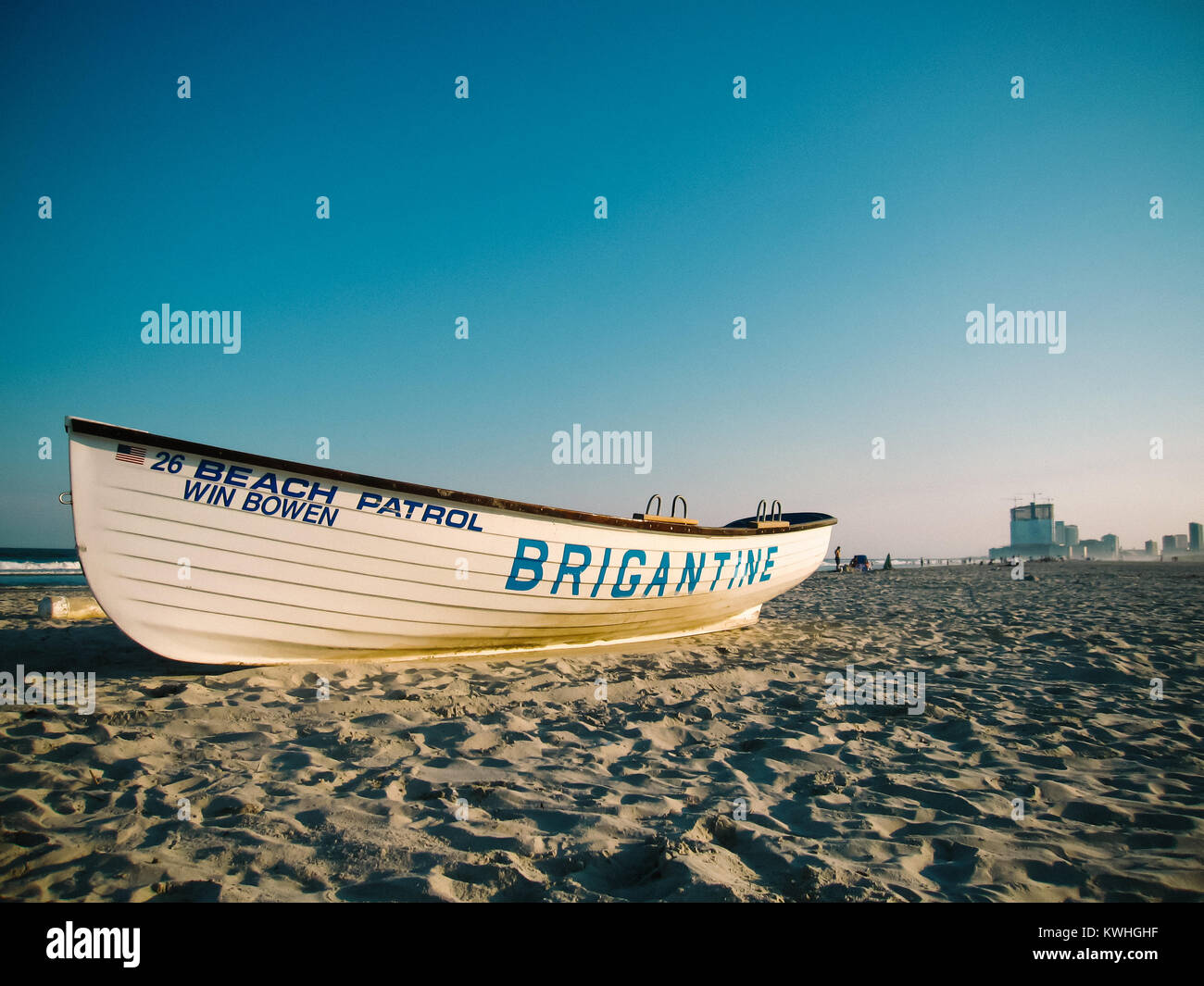 The beach in Brigantine, New Jersey during the summer with a lifeguard boat on the beach. Stock Photo
