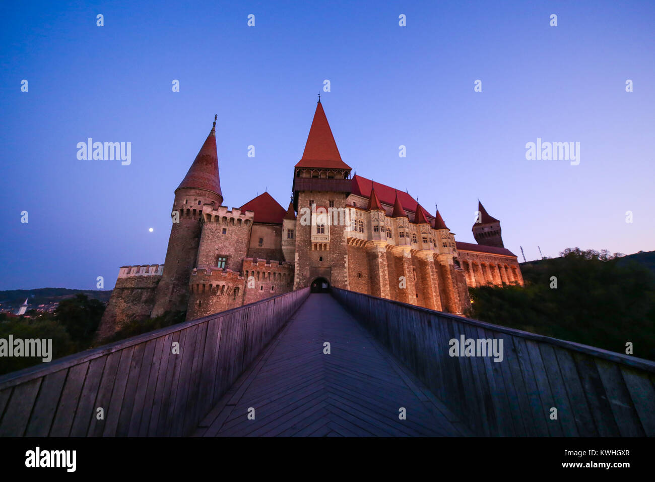Corvin Castle in Hunedoara, Romania in the evening Stock Photo