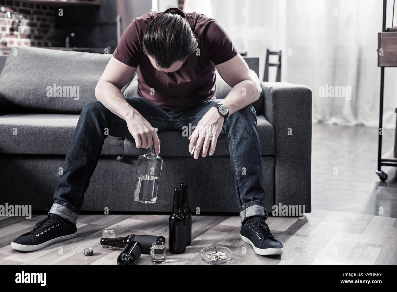 sad-male-with-bottles-hi-res-stock-photography-and-images-alamy