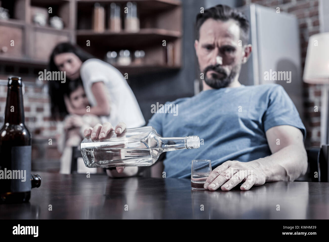 Selective focus of vodka being poured into the glass Stock Photo