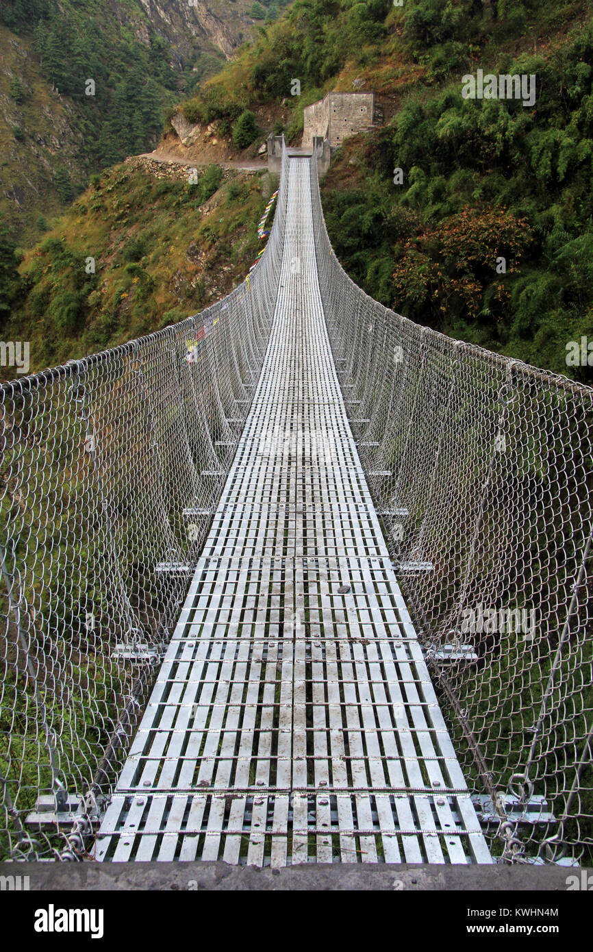 Suspension bridge and mountain in Nepal Stock Photo - Alamy