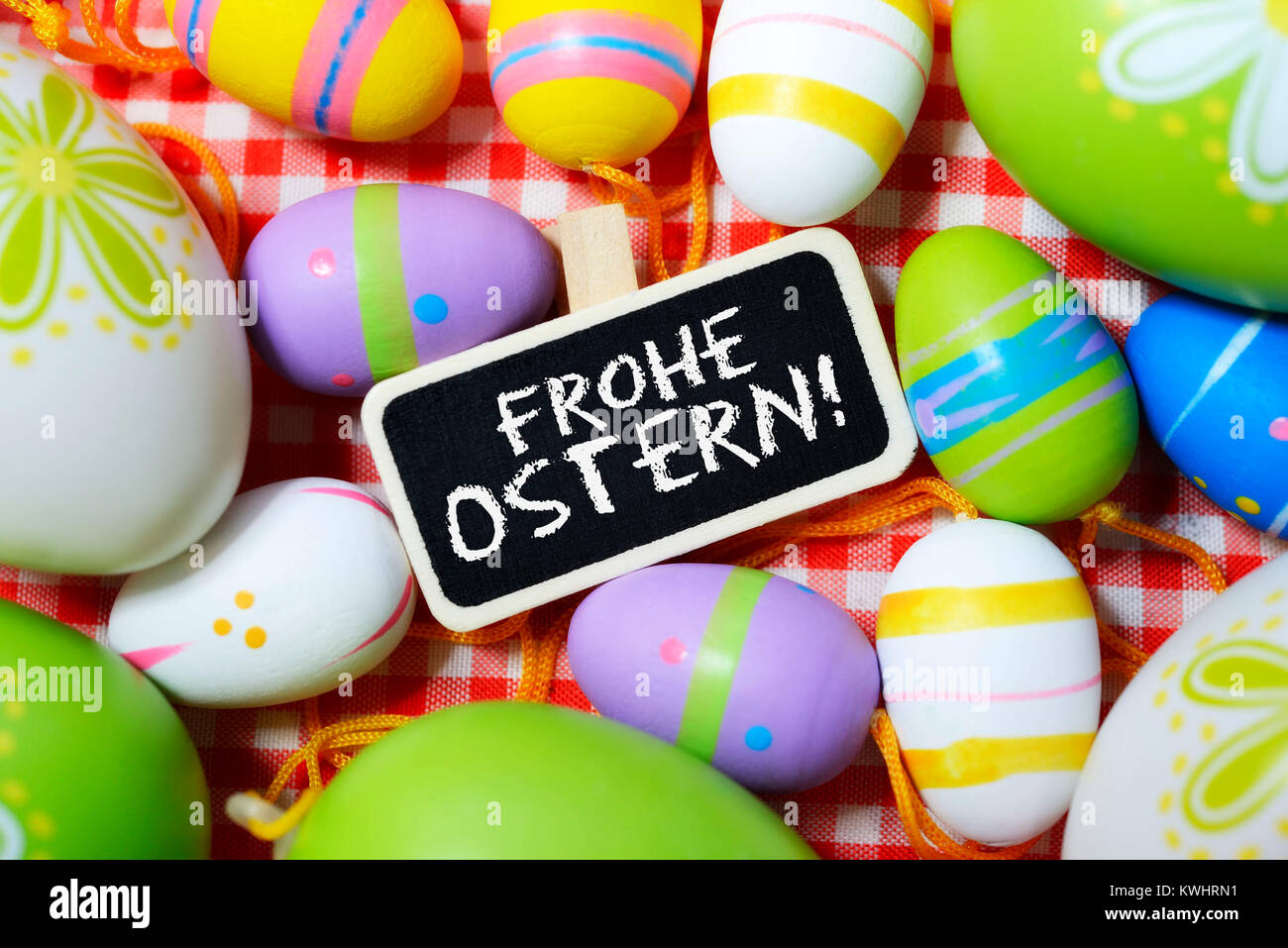 Coloured Easter eggs and Easter greeting, Bunte Ostereier und Ostergruss Stock Photo