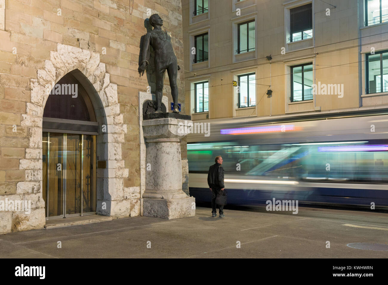 GenGeneva, Switzerland, at night / november 3, 2017 : Place de Bel Air - Statue of Philibert Berthelier. Stock Photo