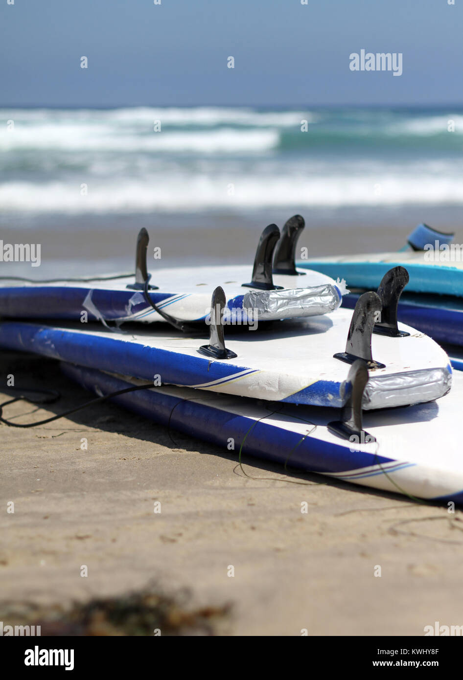 Pile of surfboards at the beach in California Stock Photo Alamy