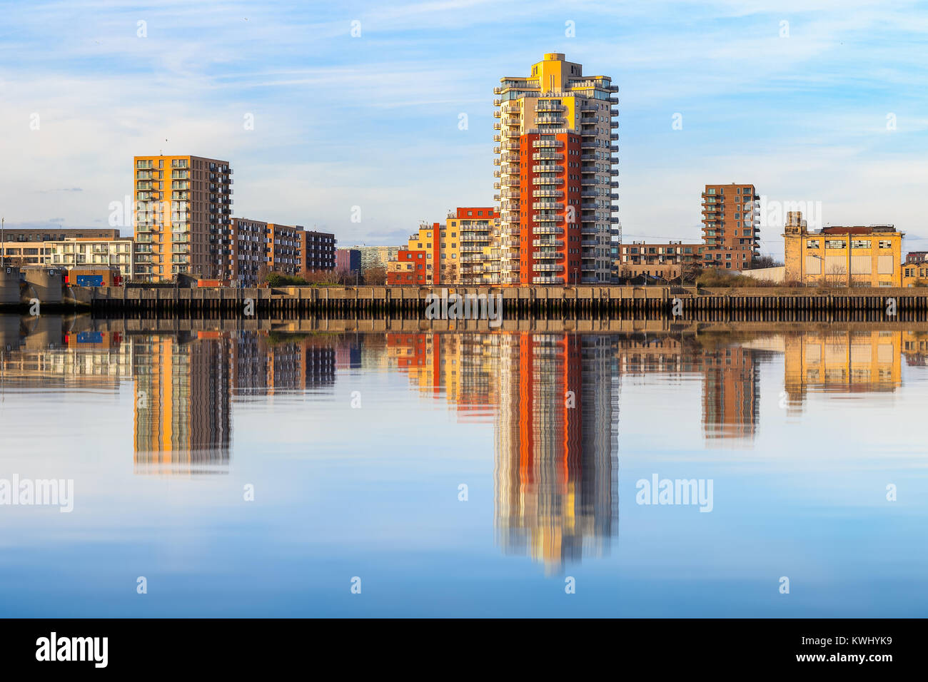 Riverside apartment next to Thames Barrier with its reflection from