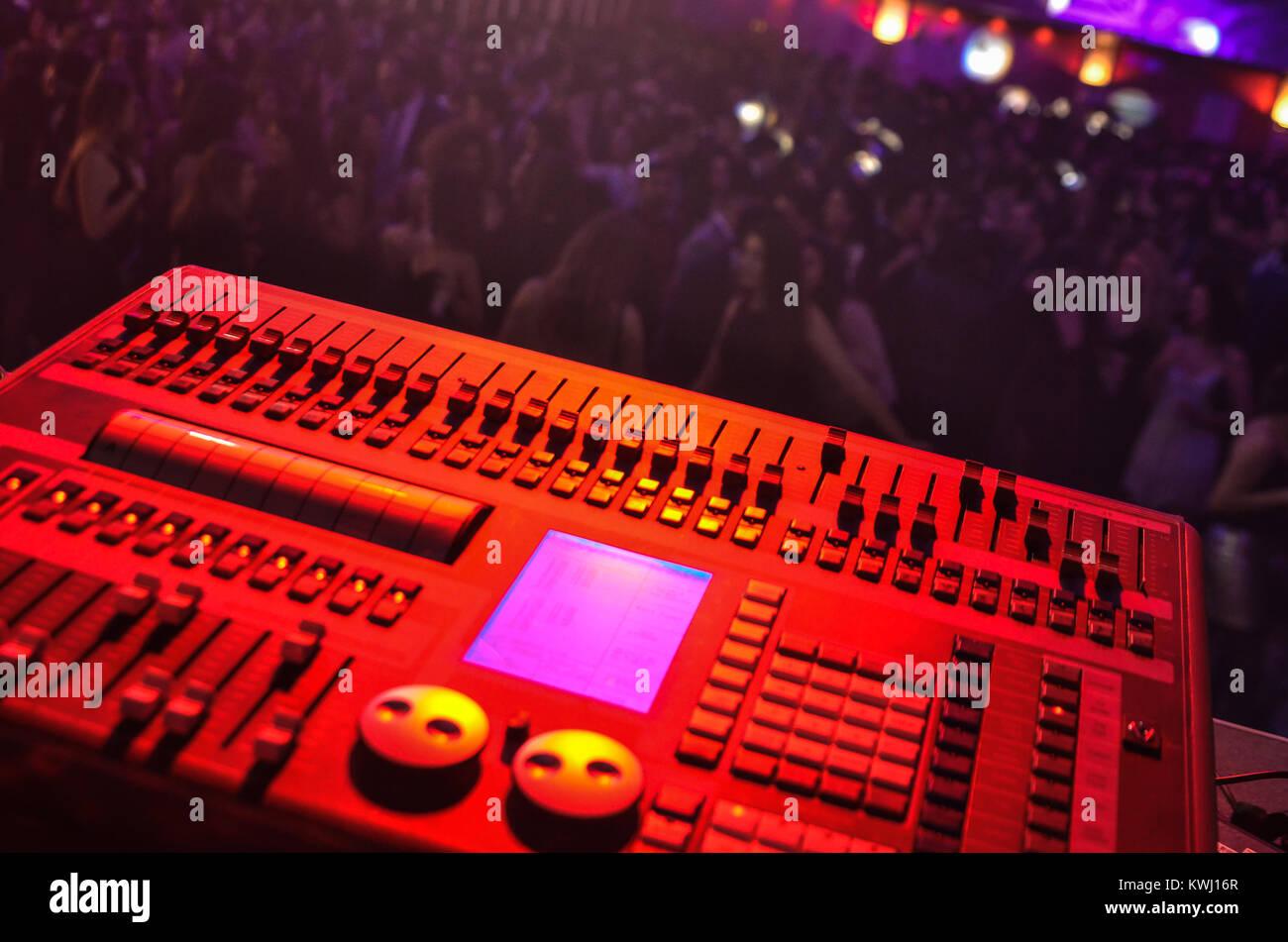 Mixer sound control in festival music. blurred people Stock Photo