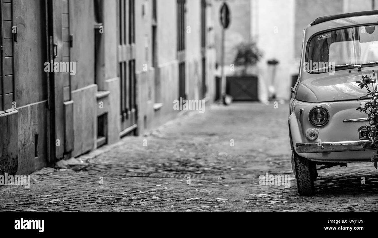 Classic & Iconic Fiat 500 parked on a cobbled backstreet in Rome Stock ...