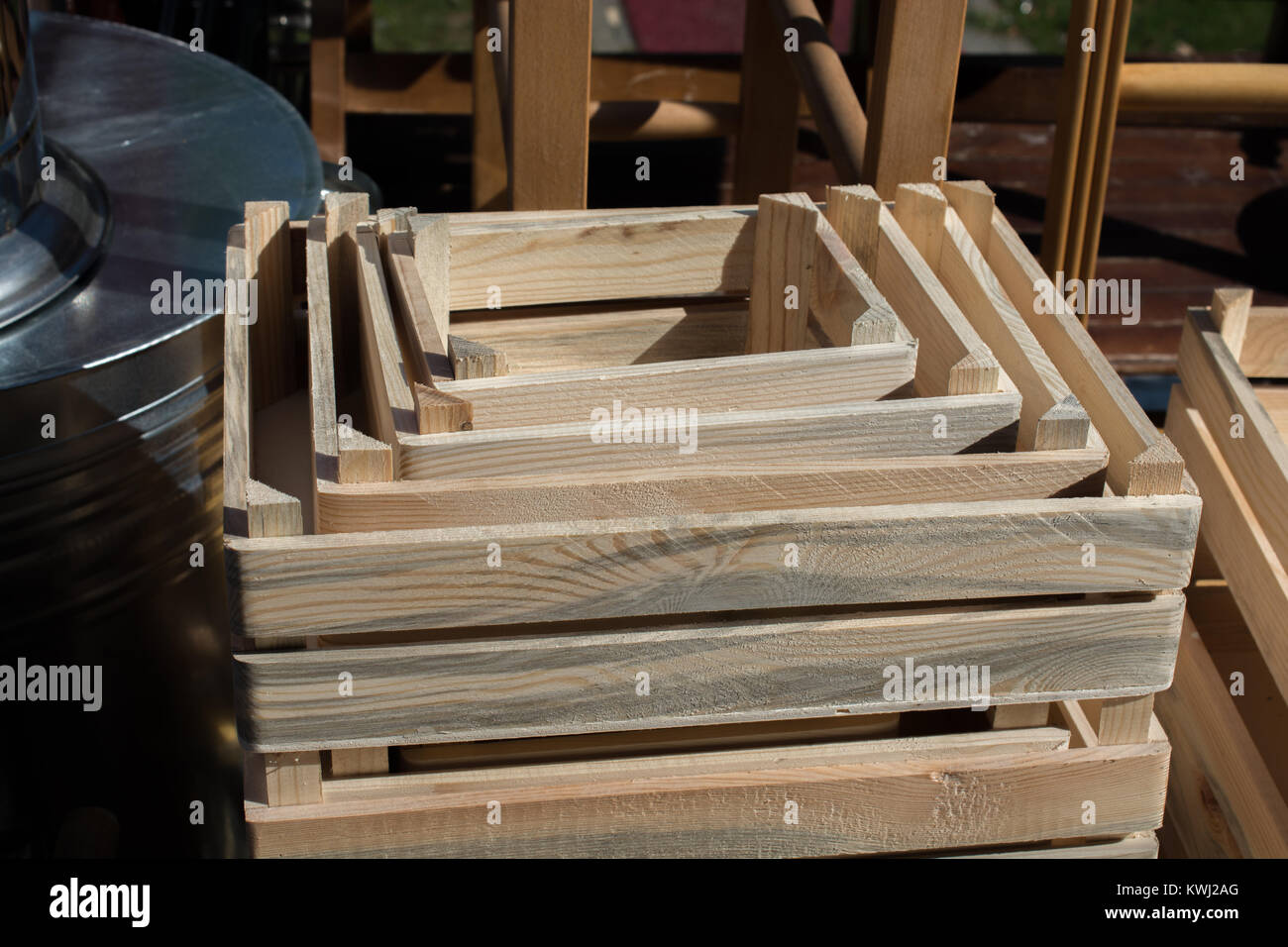 Wooden empty crate box for sale in a market Stock Photo - Alamy