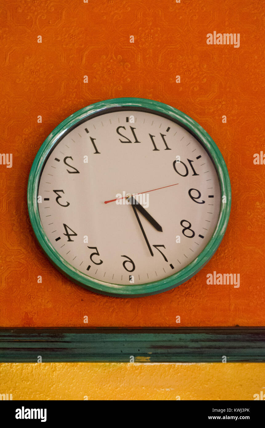 Runs Counterclockwise and Reverse Black Backwards Wall Clock