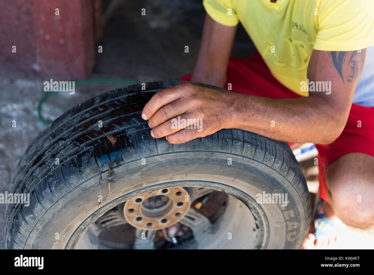 Tires are repaired in Cuban style by the tire service at the gas