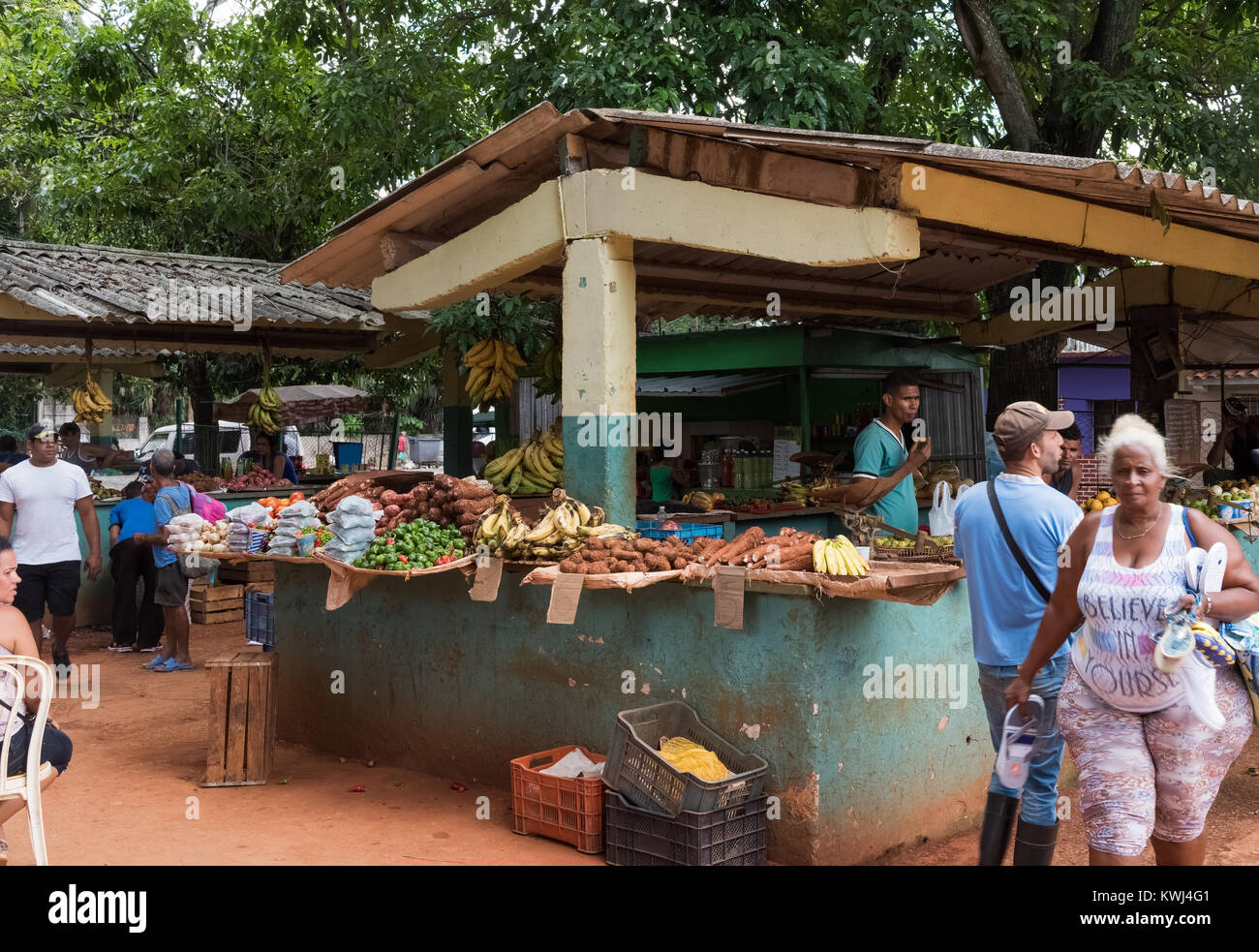 Cuban market with cuban peoples and fruits and vegetables in the suburb