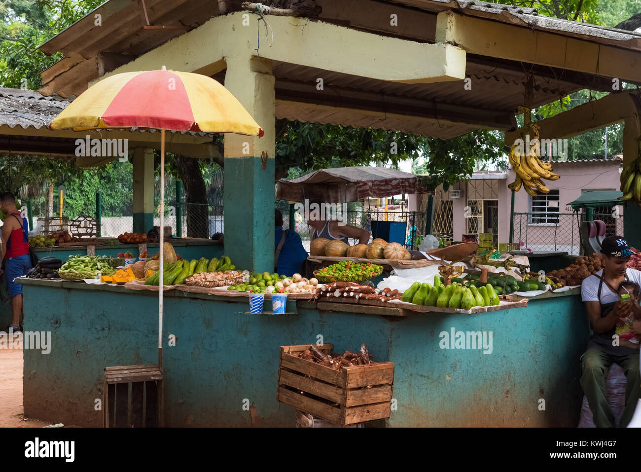 Cuban market with cuban peoples and fruits and vegetables in the suburb