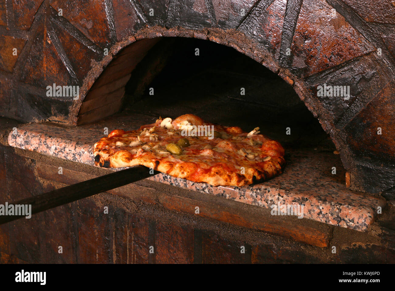 delicious pizza and brick oven pizzeria Stock Photo