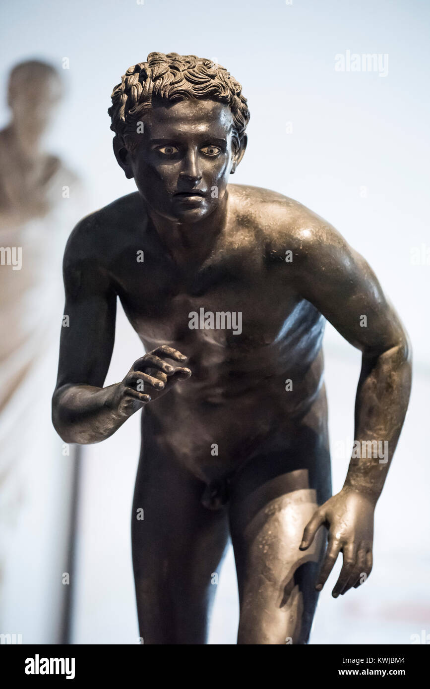 Naples. Italy. Bronze statue of an athlete (probably a runner) from the Villa dei Papiri in Herculaneum. Museo Archeologico Nazionale di Napoli. Naple Stock Photo