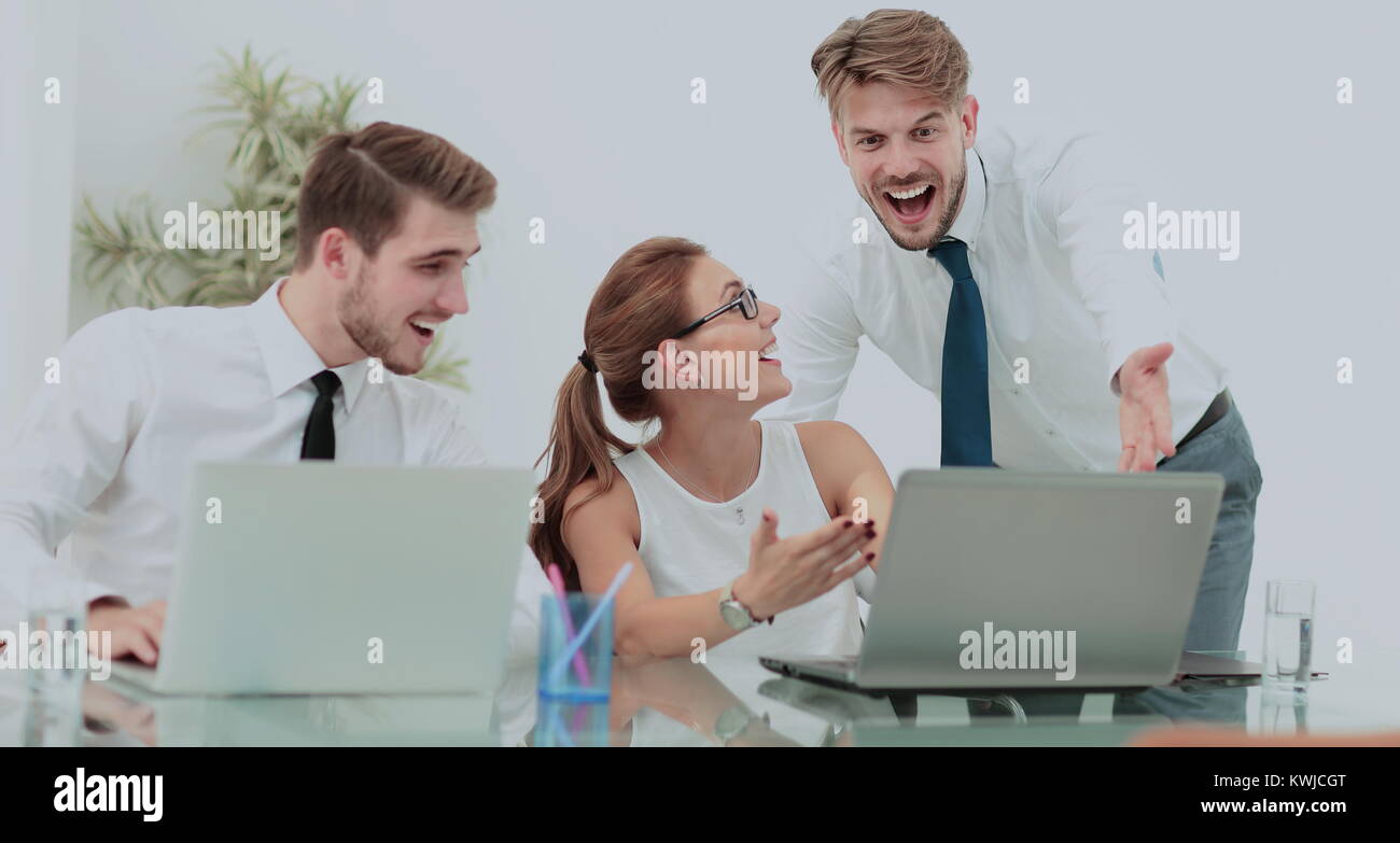 Successful business team with arms up at the office Stock Photo - Alamy