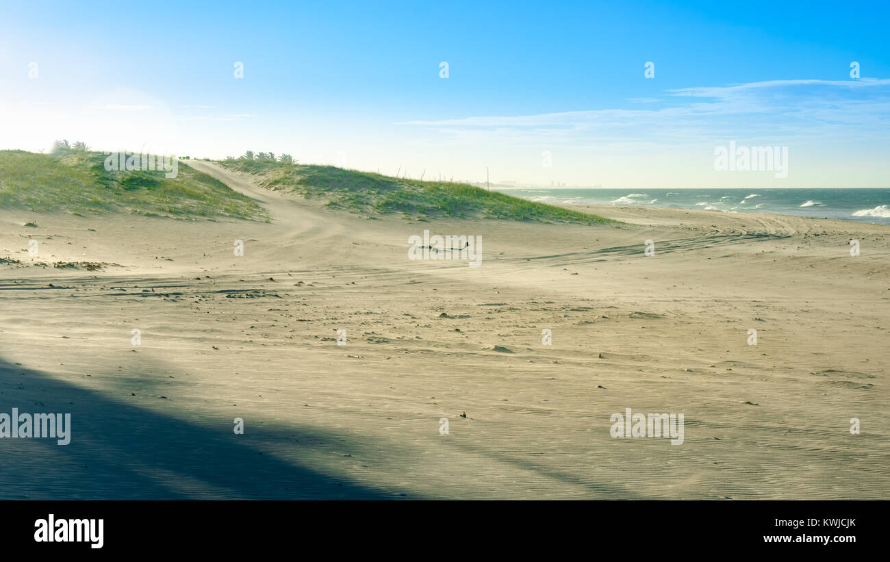 Strong Beach Wavy sand on the beach due to strong wind Stock Photo - Alamy