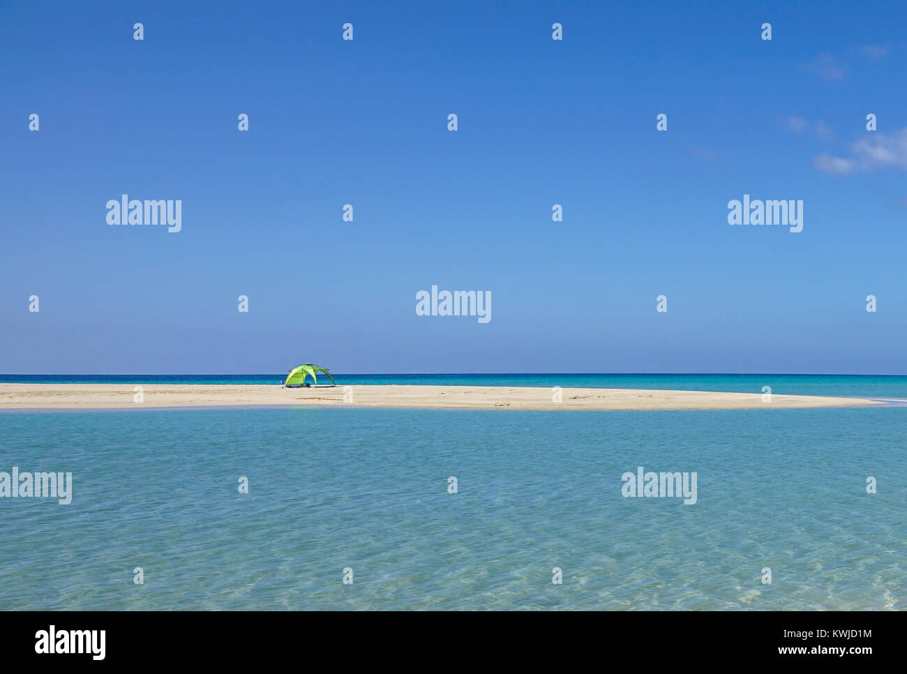Sea view from tropical beach with sunny sky. Stock Photo