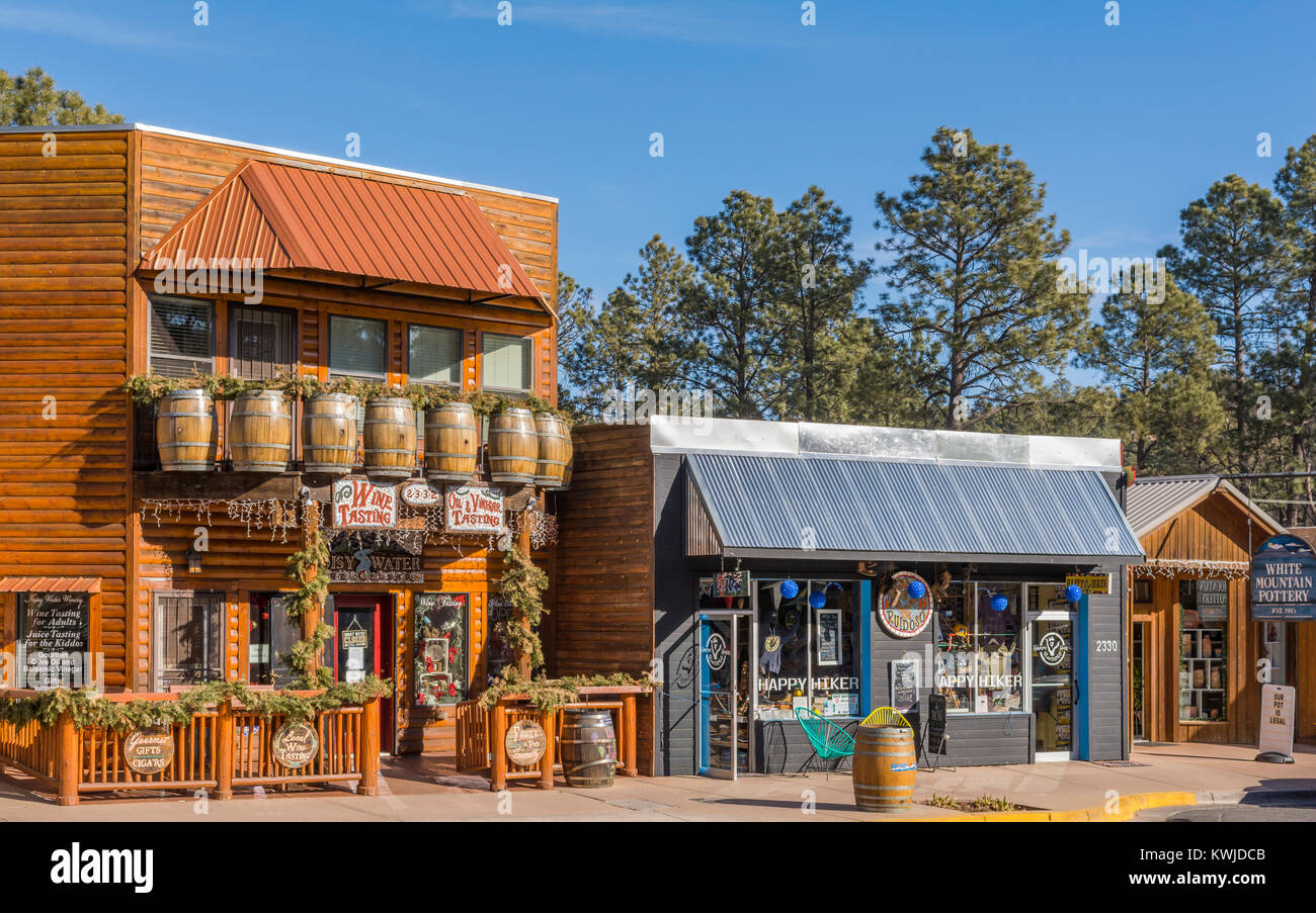 Western style  exterior storefronts of tourist shops, wine tasting, hiking, pottery in the mountain town of Ruidoso, New Mexico, USA. Stock Photo