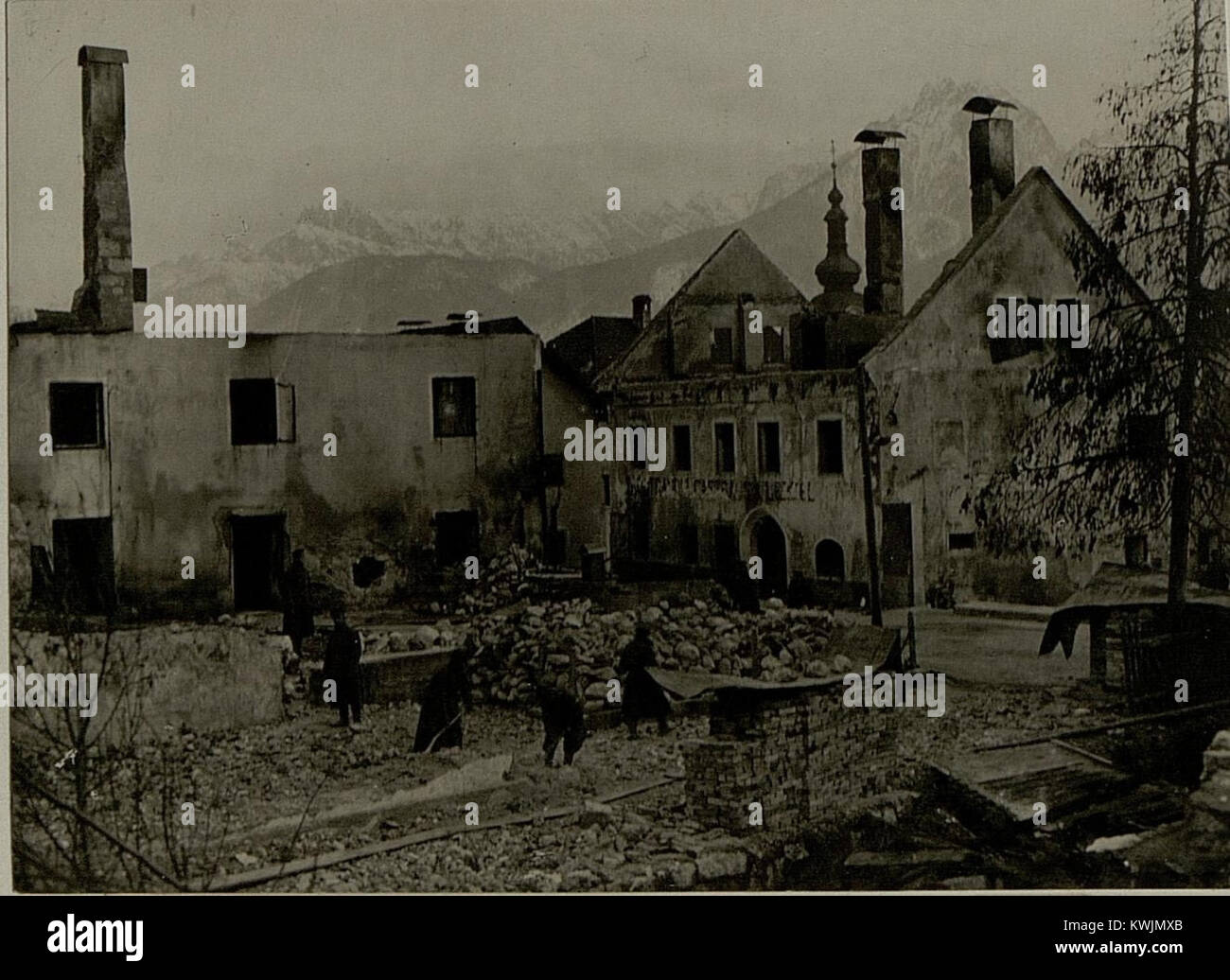 This photograph shows the destroyed houses in Tarvis, Italy, reflecting ...