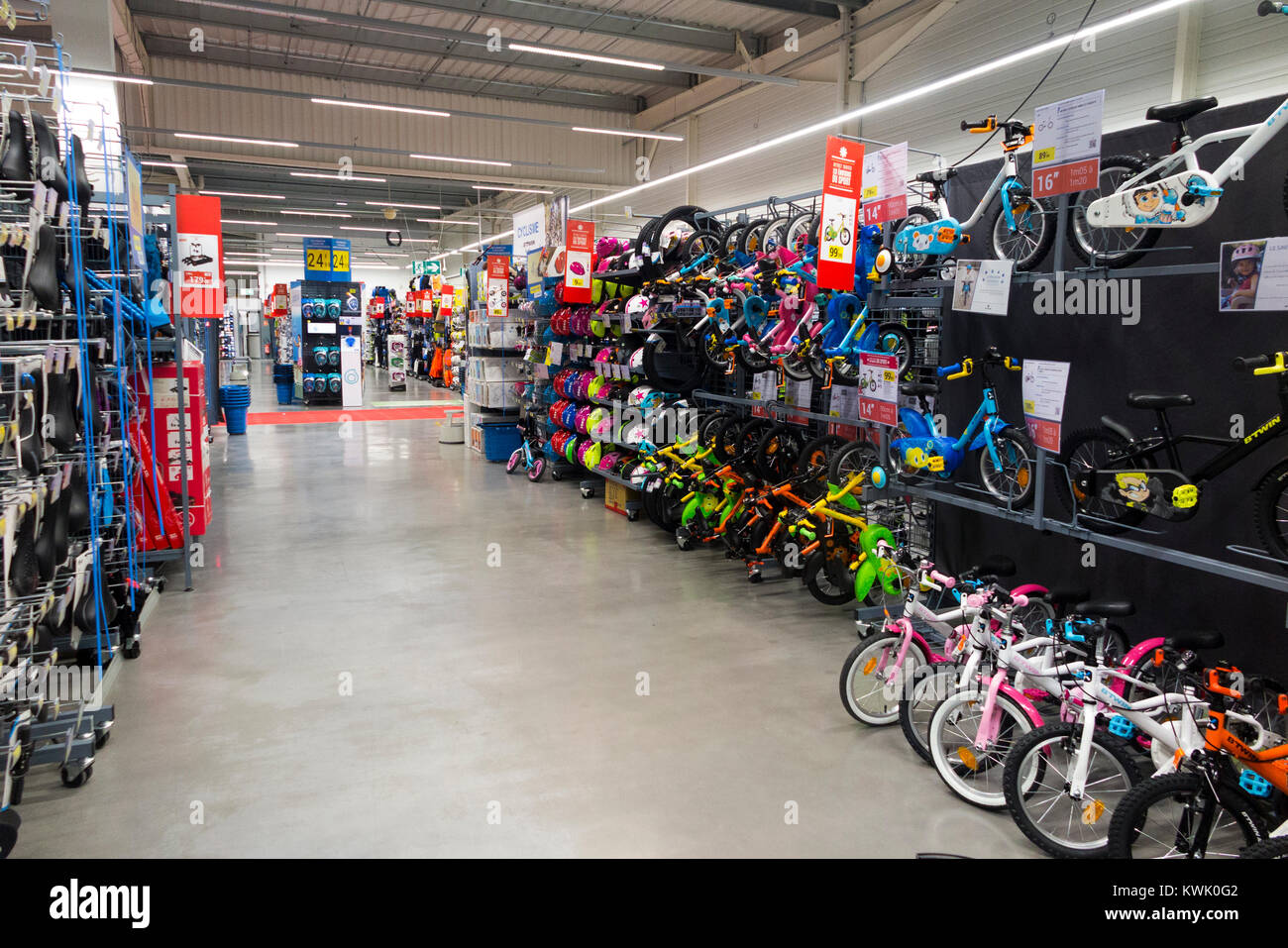 Cycle aisle / children's new bikes on sale in Decathlon store / shop / sports equipment retailer in France / French superstore at Grésy-sur-Aix. France. (93) Stock Photo