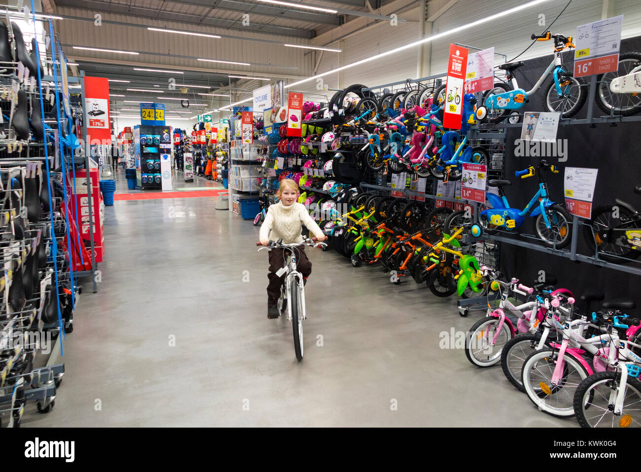Children ride new bikes on sale in 