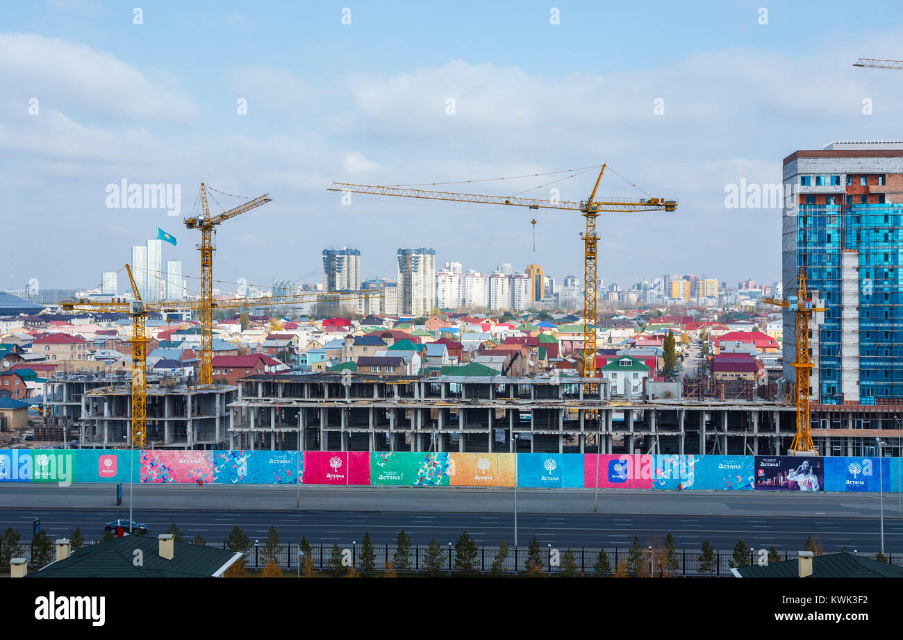Building works being carried out on development of new modern buildings and view over the town, Nur-Sultan (Astana), capital city of Kazakhstan Stock Photo