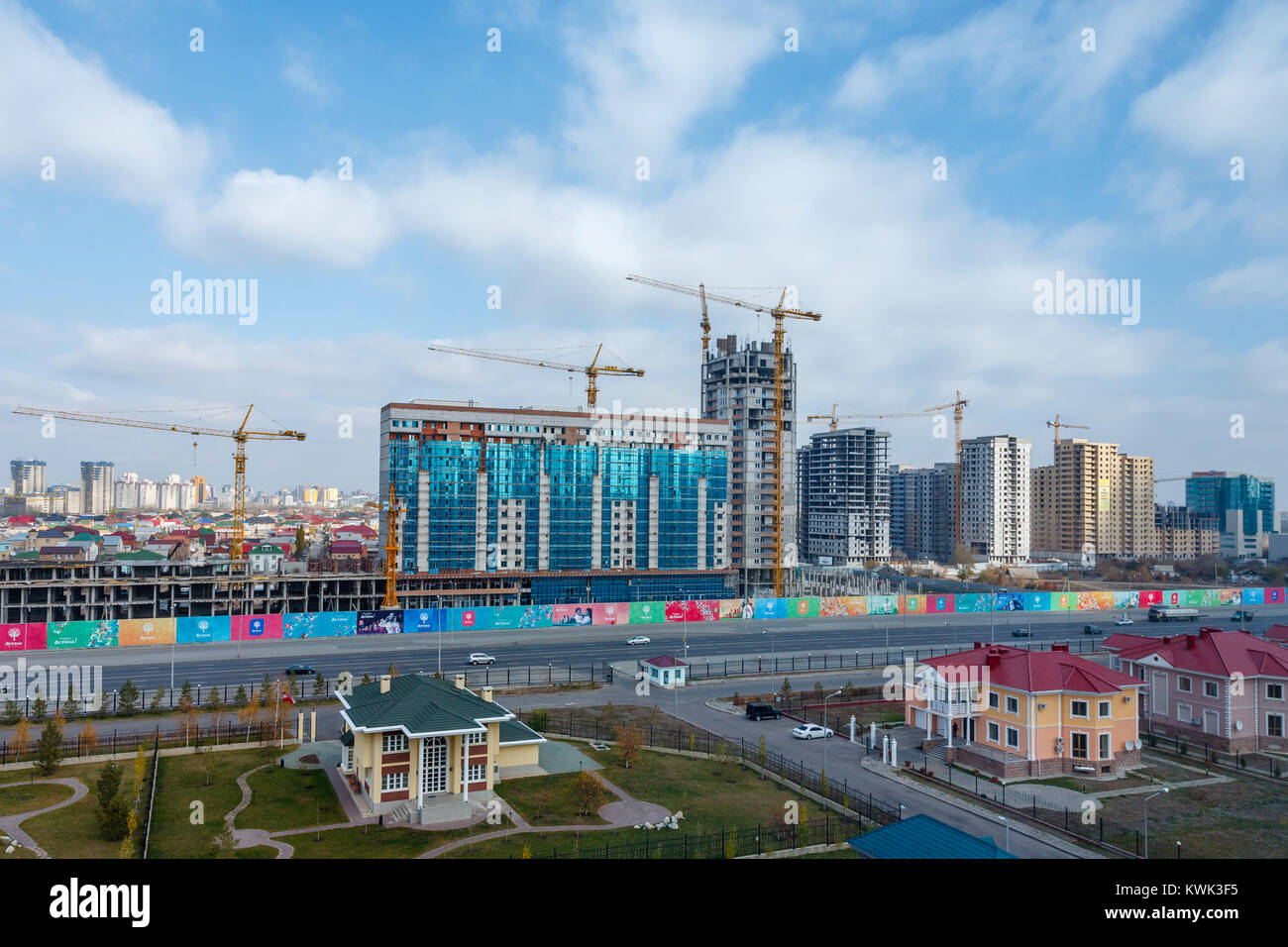 Building works being carried out on development of new modern buildings and view over the town, Nur-Sultan (Astana), capital city of Kazakhstan Stock Photo