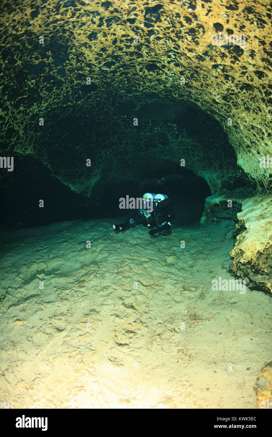 divers underwater caves diving Florida United States of America Stock