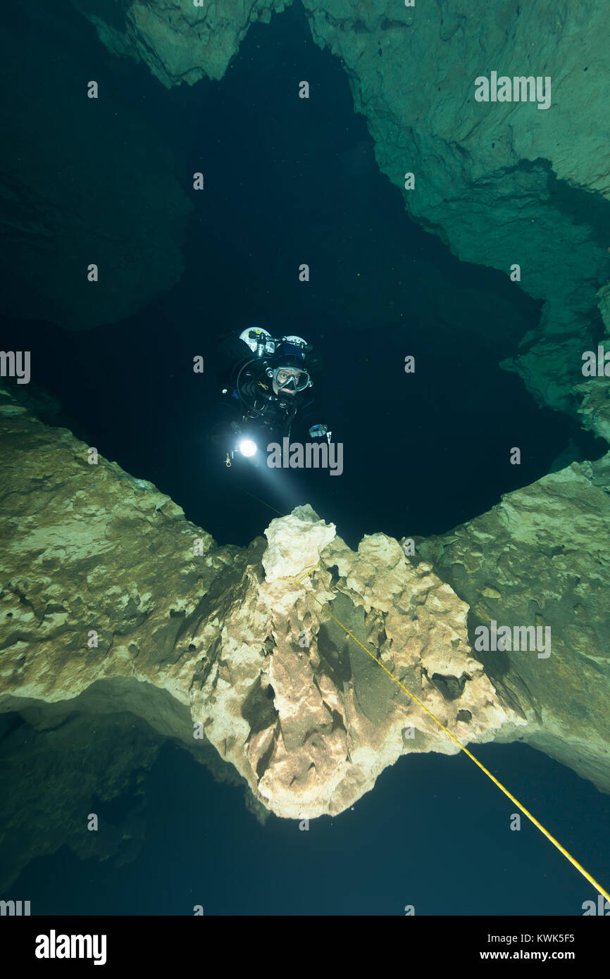 divers underwater caves diving Florida United States of America Stock