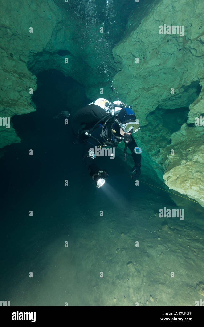 divers underwater caves diving Florida United States of America Stock