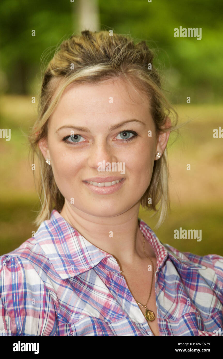 Pretty blonde girl - head and shoulders Stock Photo - Alamy