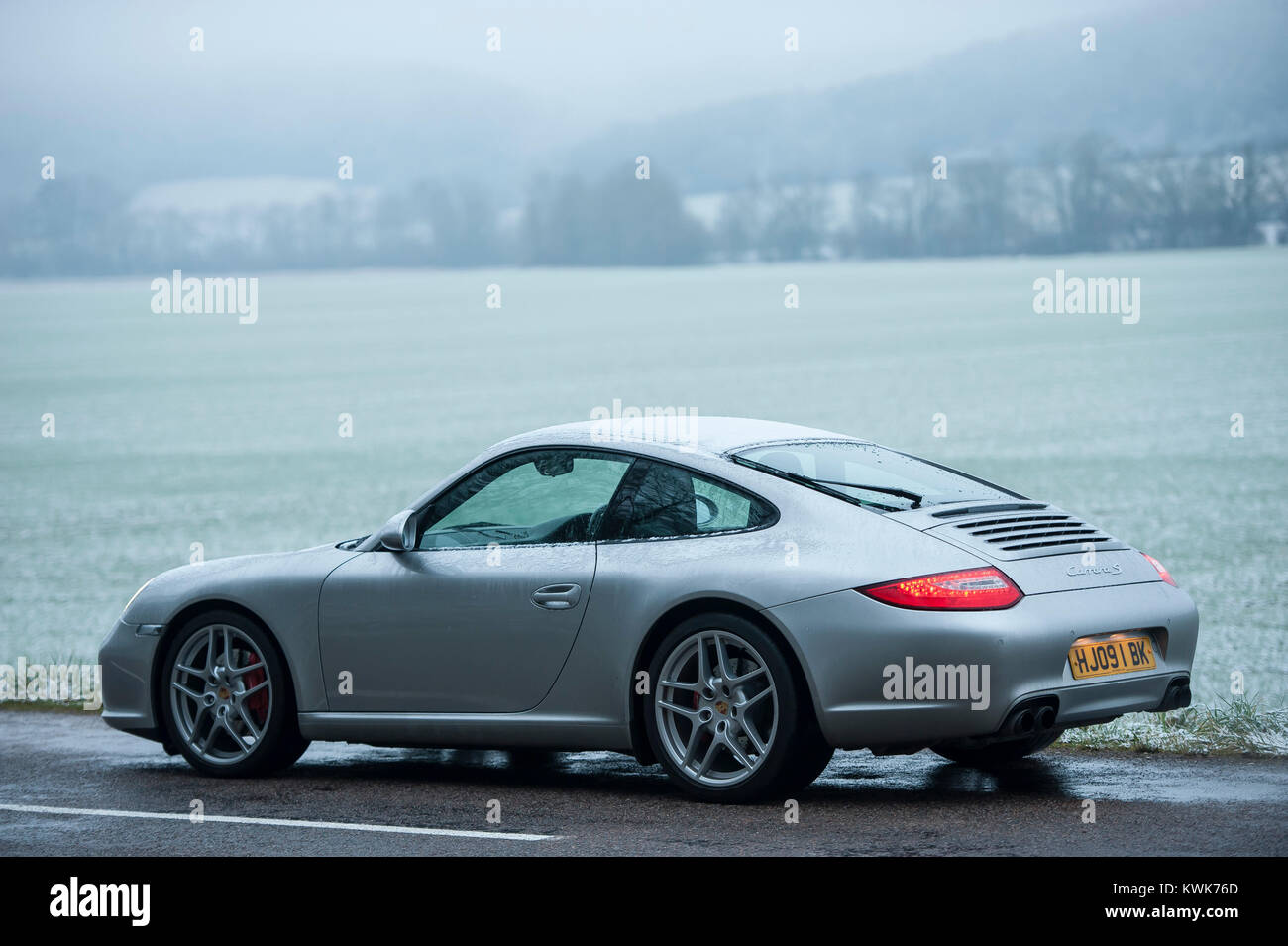 Porsche 911 Carrera S  in winter with snow on the ground in France  Stock Photo - Alamy