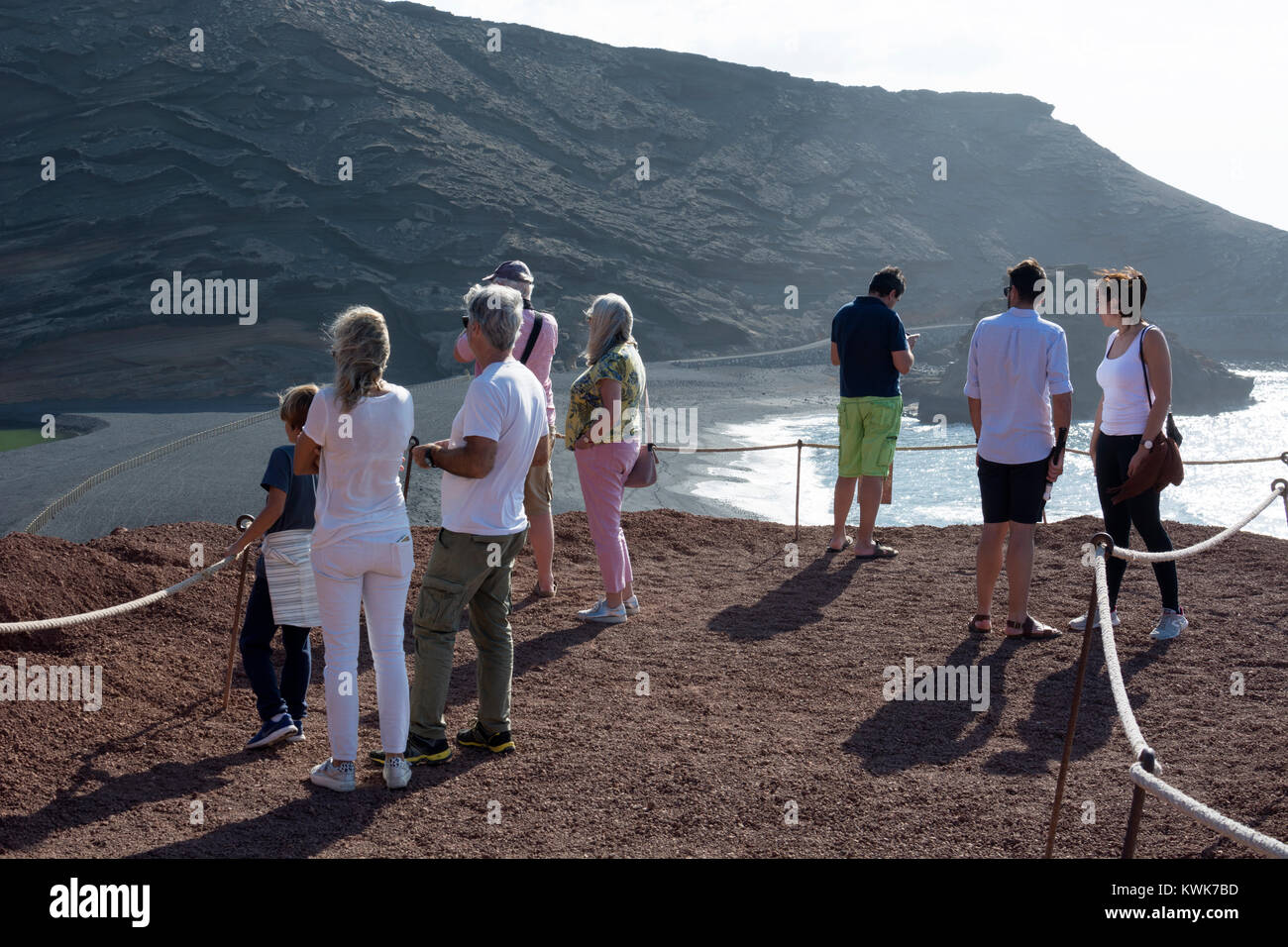 Tourists at the Green Lagoon viewpoint, El Golfo, Lanzarote, Canary Islands, Spain. Stock Photo