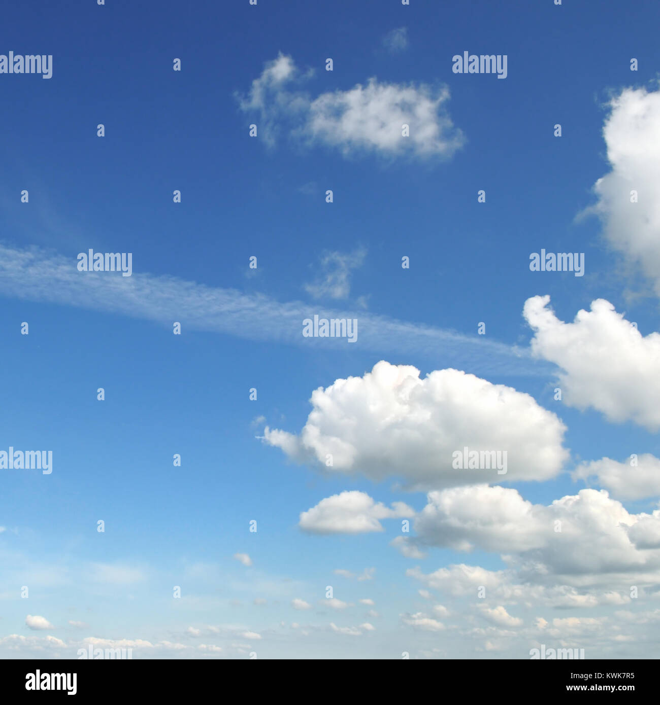 light cumulus clouds in the blue sky Stock Photo - Alamy