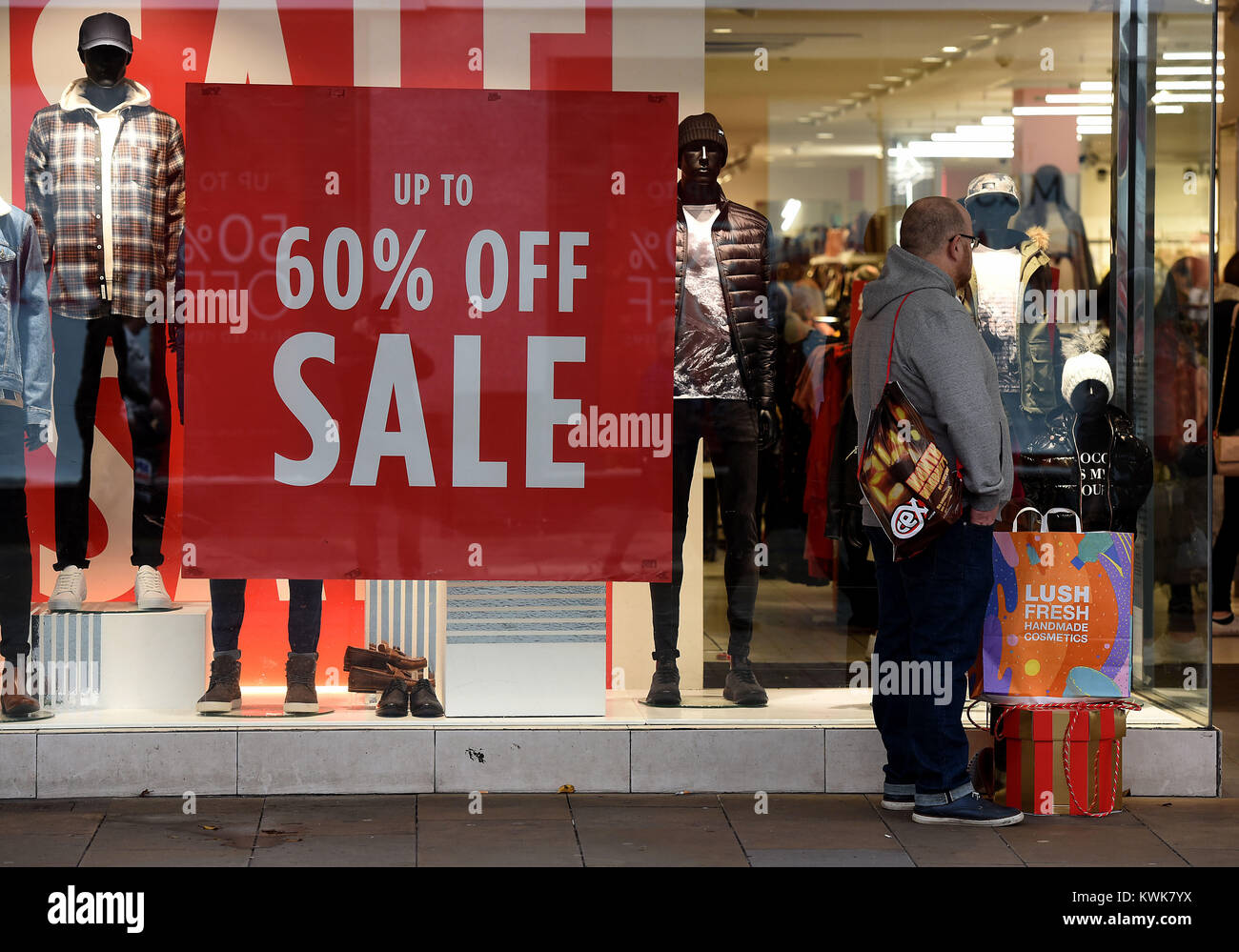 Christmas shopping, Christmas sales, Boxing Day Sales, Topshop, Next, M&S,  Lush Cosmetics , Sale signs. Swansea and Cardiff Stock Photo - Alamy