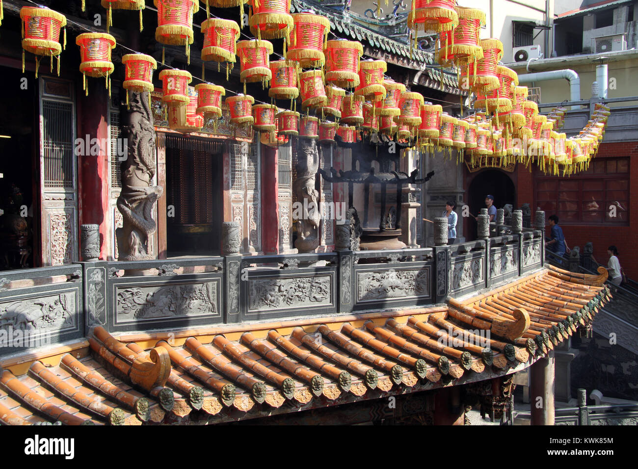 Chinese lamps and peiople in godness Matsu temple in Lukang, Taiwan Stock Photo