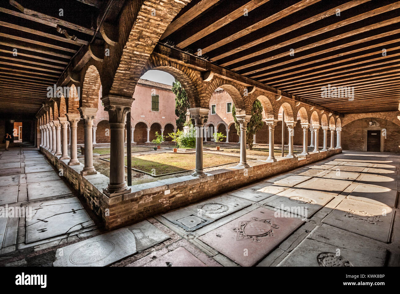 Inner Courtyard of the Church of San Francesco della Vigna with grave stones of former monks, Venice, Italy Stock Photo