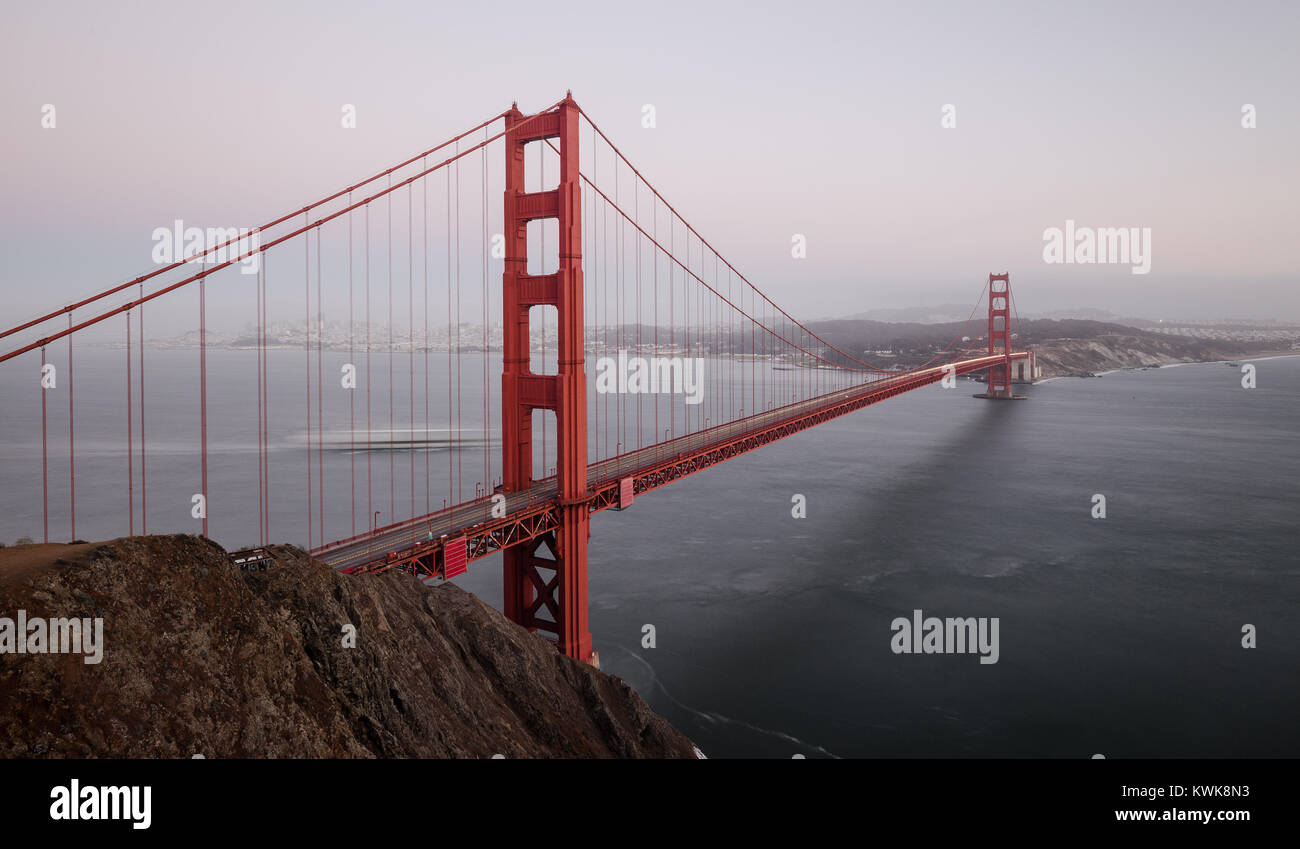 Classic panoramic view of famous Golden Gate Bridge seen from famous Battery Spencer viewpoint in beautiful post sunset twilight during blue hour at d Stock Photo