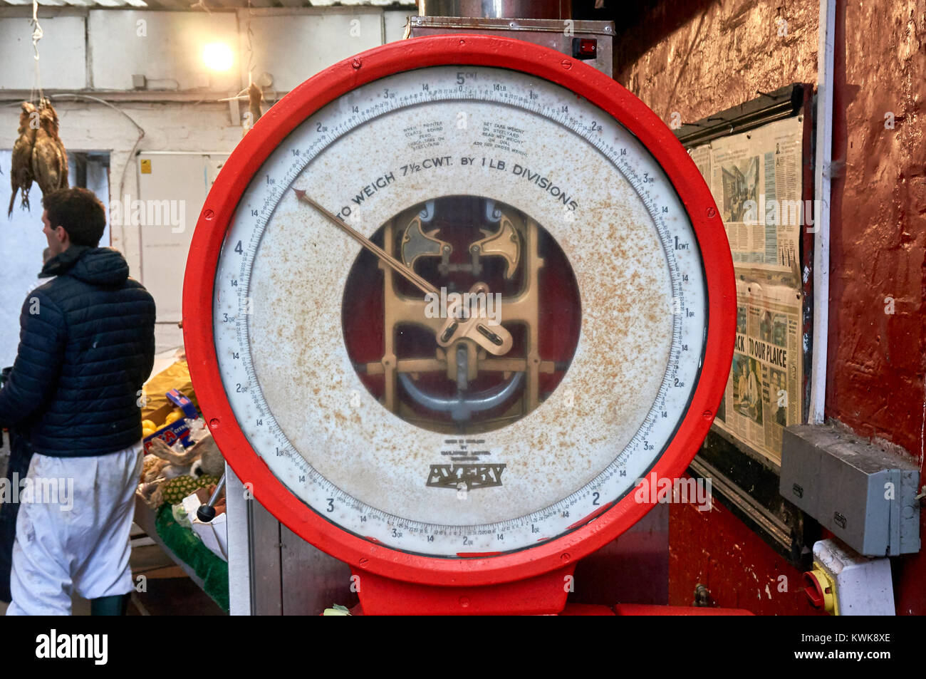 Old style industrial 250 kg dial scale platform by Avery, at a local butcher in Glasgow. Stock Photo