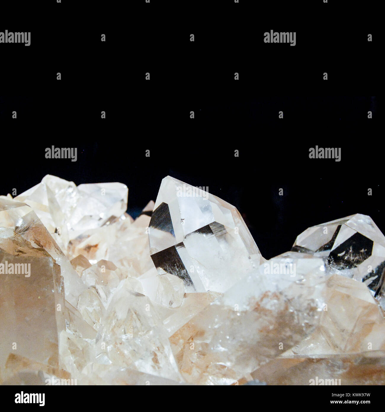 very big quartz crystals on black background Stock Photo - Alamy