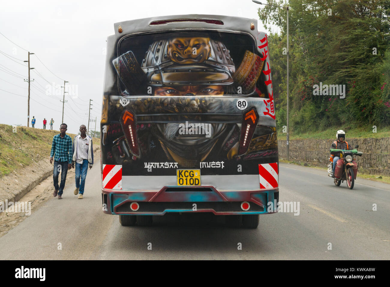 A bus decorated in artwork depicting a Japanese samurai, Kenya, East Africa Stock Photo