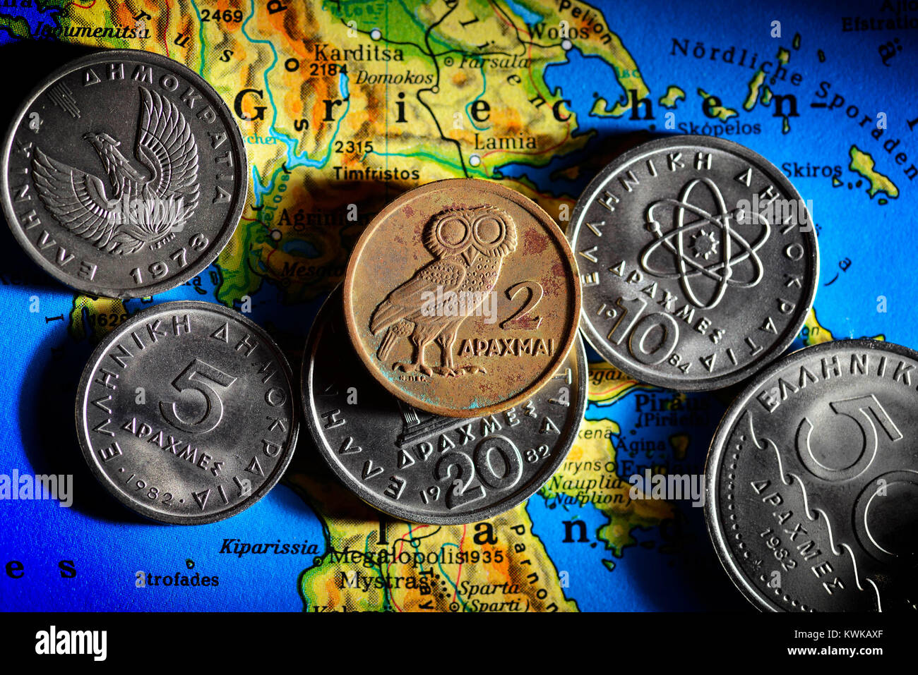 Greek drachms on map, Griechische Drachmen auf Landkarte Stock Photo