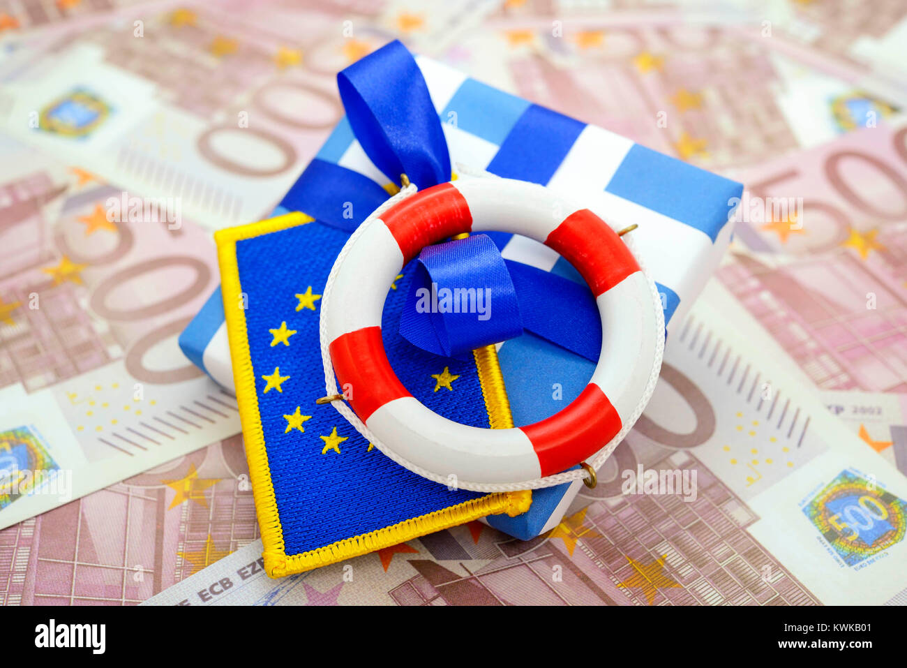 Package in Greek national colours with EU flag and life preserver on 500-euro-bank notes, rescue package for Greece, Paket in griechischen Nationalfar Stock Photo