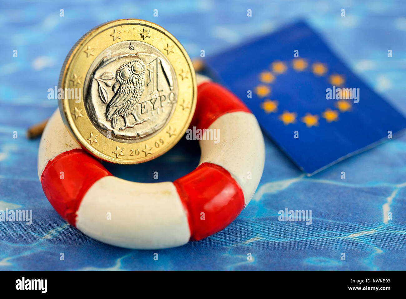 Greek euro on life preserver, financial assistances for Greece, Griechischer Euro auf Rettungsring, Finanzhilfen f?r Griechenland Stock Photo