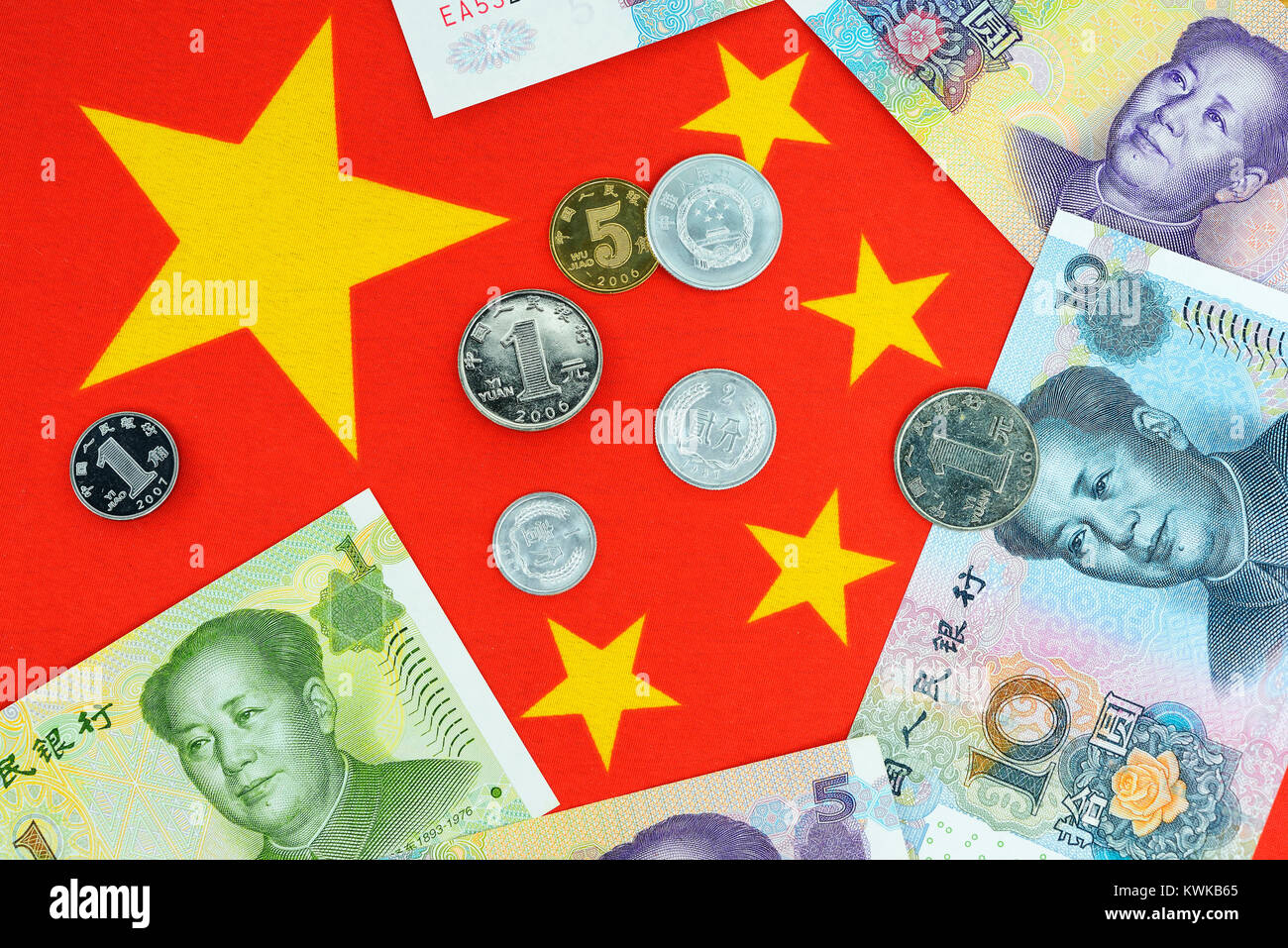 Chinese currency Renminbi on the Chinese national flag, Chinesische W?hrung Renminbi auf der chinesischen Nationalflagge Stock Photo