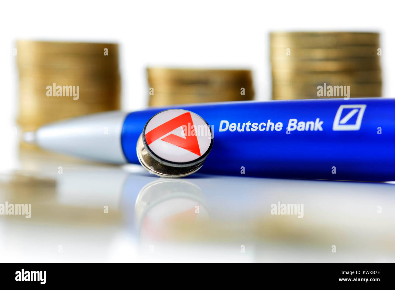 Ballpoint pen of the German bank and Pin of the agency for work, place dismantling in the German bank, Kugelschreiber der Deutschen Bank und Pin der A Stock Photo