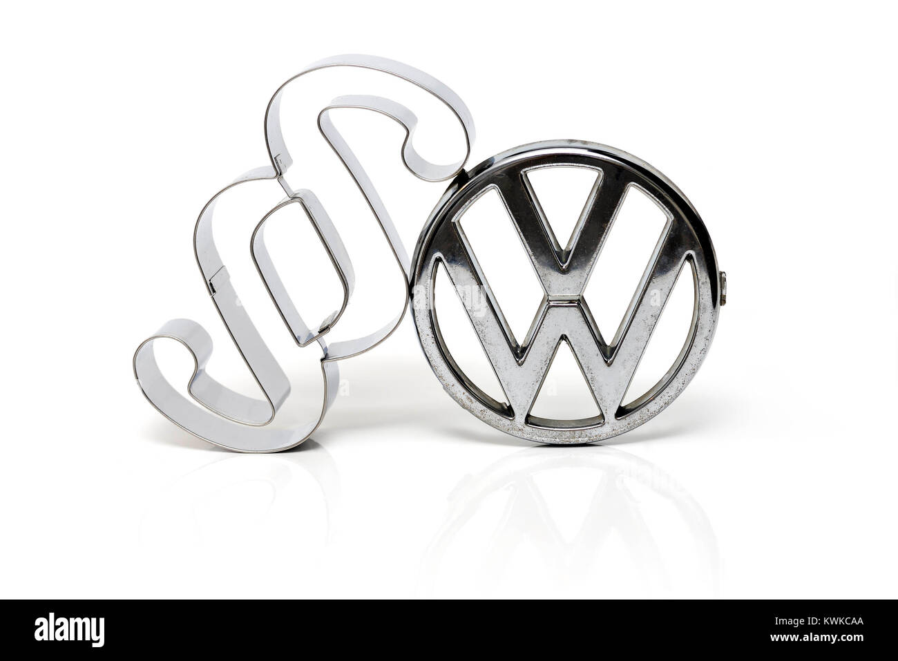 VW logo and section sign, punishments after the exhaust gas scandal, VW-Logo und Paragraphenzeichen, Strafen nach dem Abgasskandal Stock Photo