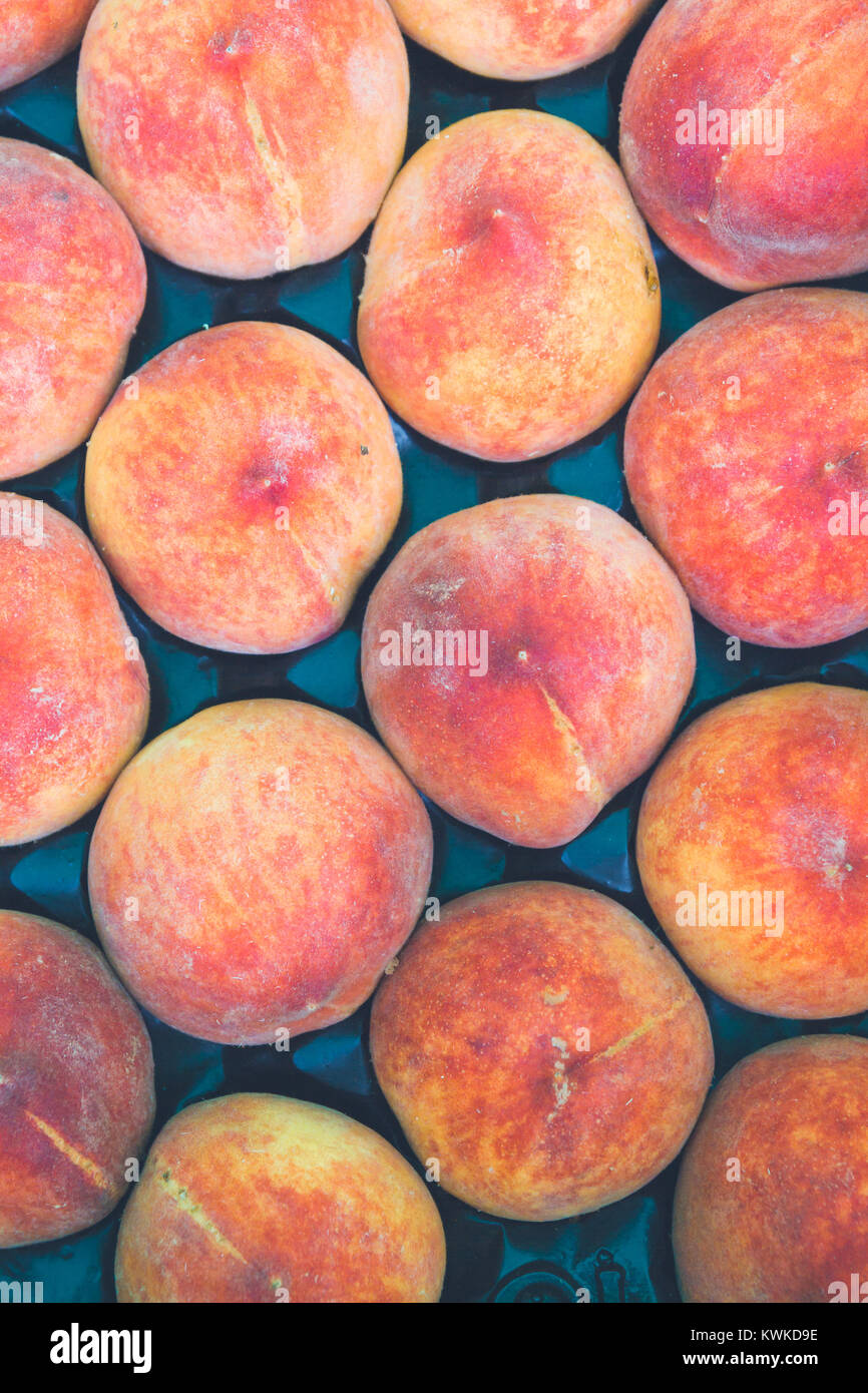 Delicious ripe peaches in the market on the counter Stock Photo - Alamy