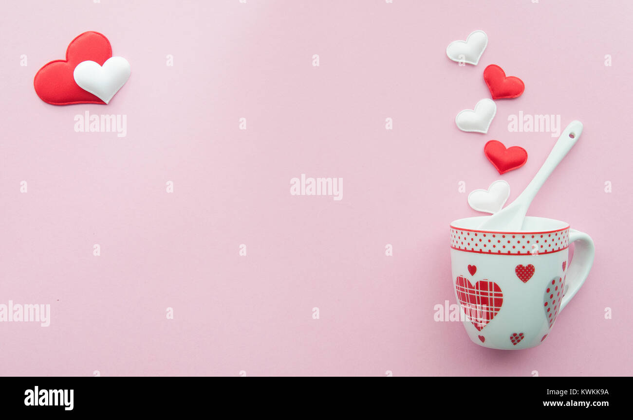 Valentine's day background with a coffee cup and steam made with hearts Stock Photo