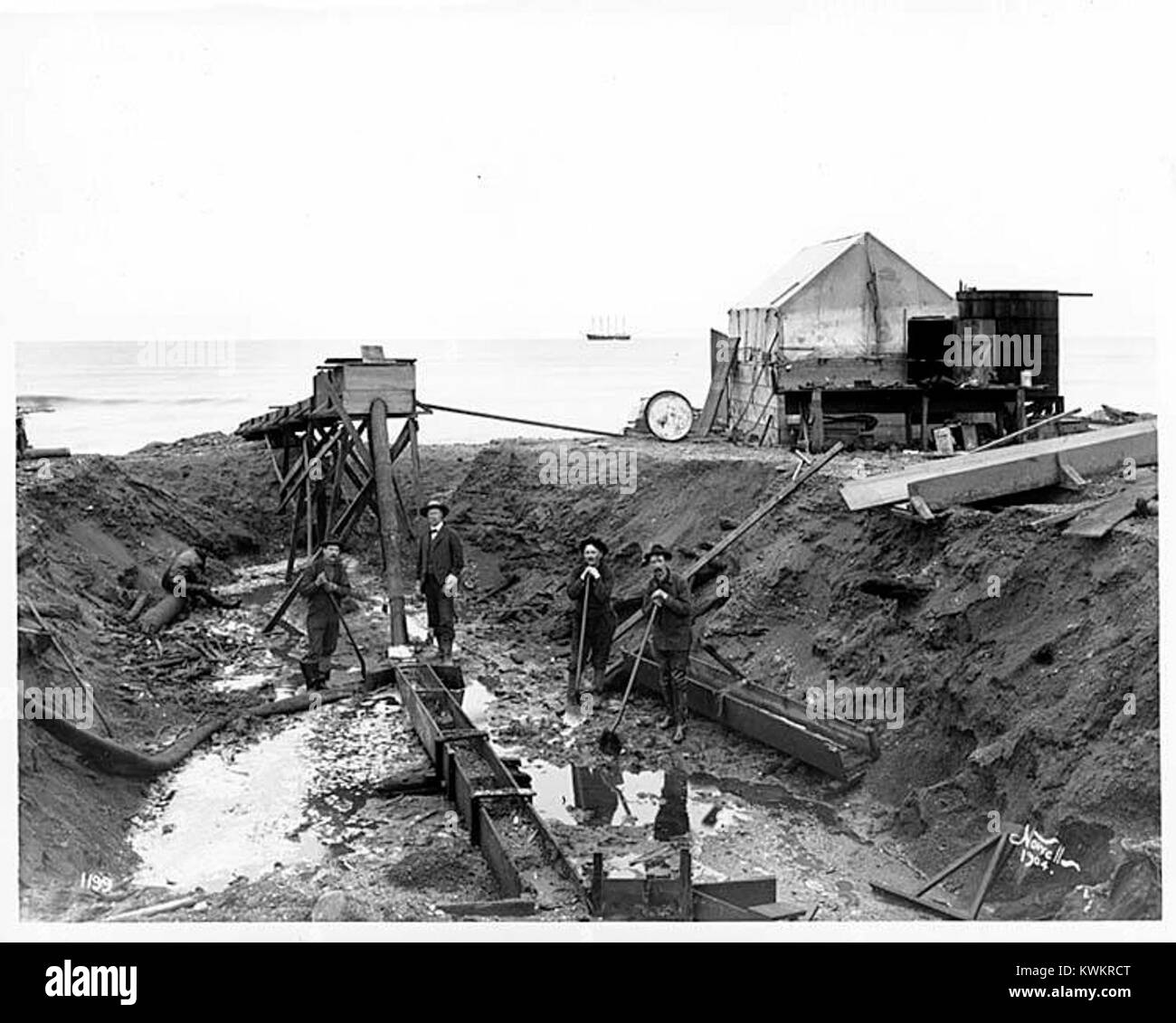 Hydraulic mining operation on Nome Beach, September 23, 1904 (NOWELL 35